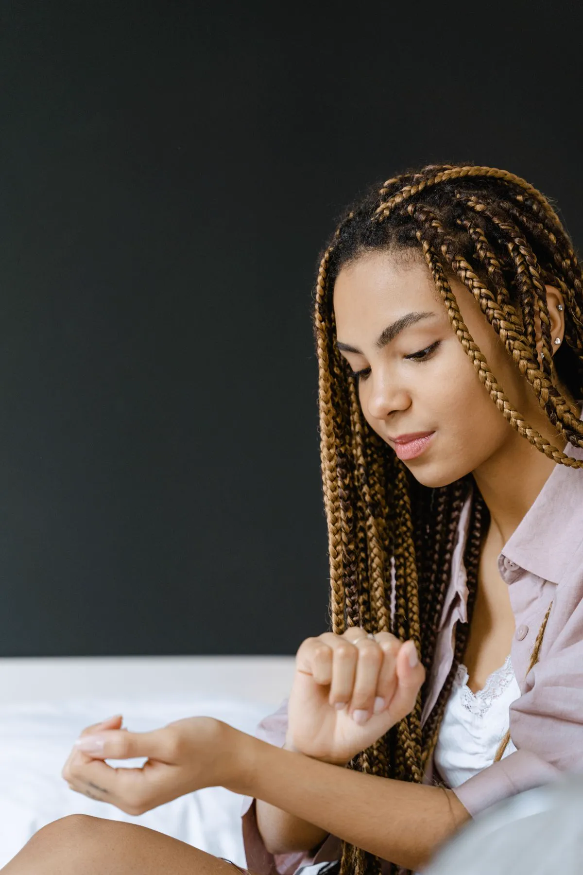 Long box braids with warm highlights